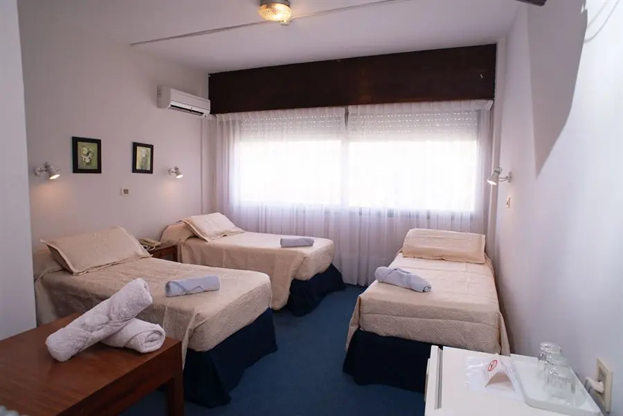 Habitación superior con tres camas